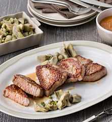 Solomillo de ternera con alcachofas, habas y guisantes (Hestan Cue™)