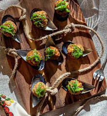 Batea de mejillones tigre rabiosos