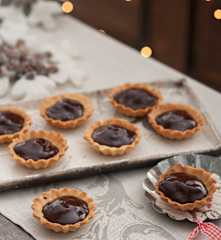 Tartaletas de chocolate con dulce de leche y nuez