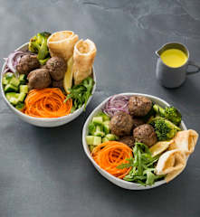 Eggplant and porcini bites with turmeric tahini dressing