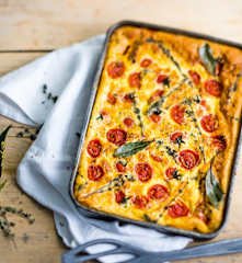 Clafoutis salé à la brousse et aux tomates cerise