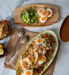 Pancit Palabok (rice noodles with chicken ragout and shrimp)