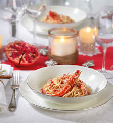 Linguine con salsa di melagrana e gamberoni