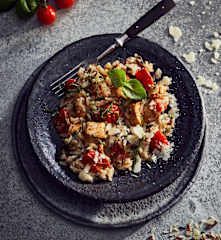Wildreis-Risotto mit Pute und Kirschtomaten
