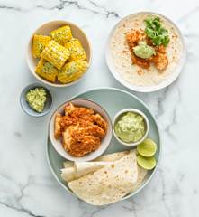 Chilli chicken with corn and avocado cream
