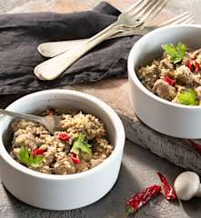 Carrilleras de cerdo con champiñones, alcachofas y cuscús