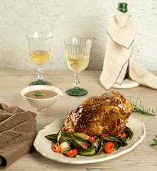 Arrosto di maiale con purea di mele e cipolle