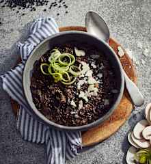 Linsotto mit Speck und Pilzen