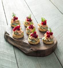 Poached salmon and beetroot blinis