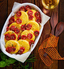 Gnocchi alla romana alle erbe con pomodorini confit