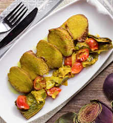 Scaloppine di seitan con carciofi, porri e pomodorini