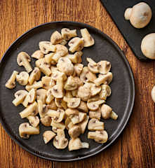 Champiñones en cuartos al vapor (400-500 g) en Varoma