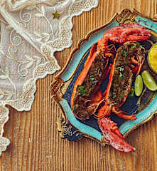 Astice gratinato al foie gras con salsa al frutto della passione