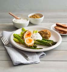 Dukkah eggs with asparagus and feta