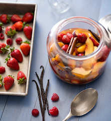 Summer fruits in mulled cider syrup