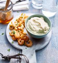 Crevettes sautées à l’ail et persil – mousseline de topinambours au miel
