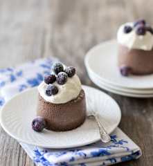 Baked chocolate ricotta with blueberries and cream