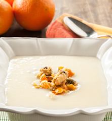 Crema parmentier al ajo con mejillones a la naranja
