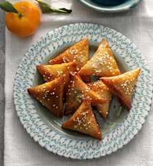 Almond briouats with honey and sesame seeds