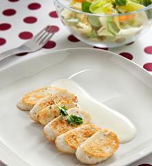 Salchichas de pollo con parmesano