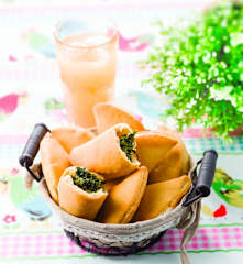 Minicalzones de espinafres e ricota