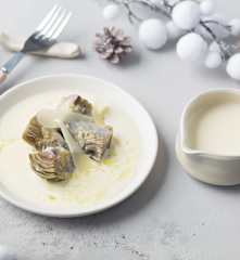 Alcachofas confitadas con crema de queso Idiazábal