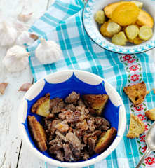 Carne em vinha de alhos