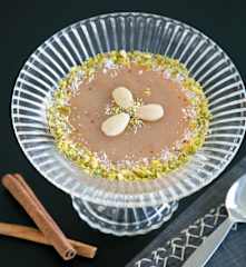 Spiced rice pudding (meghli)