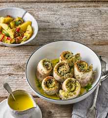 Wolfsbarschröllchen mit Orangensauce