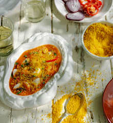 Moqueca de peixe e farofa