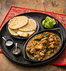 Kuruma iraichchi with coconut roti