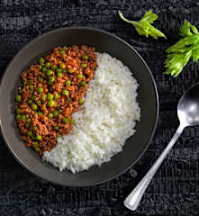 Riso con piselli e ragù