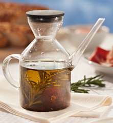 Aceite con tomates secos, romero y tomillo