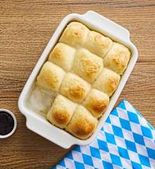 Dampfnudeln con confettura di ciliegie