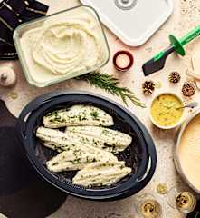Bisque de crevettes à l'orange, bar aux herbes et purée de panais