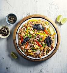 Paella di pesce con bulgur