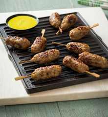 Prawn and pork pops with turmeric lime sauce