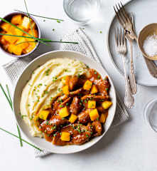 Presa de cerdo con salsa de mango