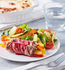 Rollos de rib eye con gratinado de papas