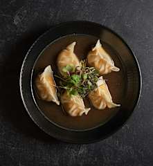 Kabocha Squash Dumplings in Dashi Broth (Matthew Kenney)