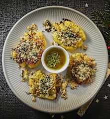 Patate schiacciate al forno