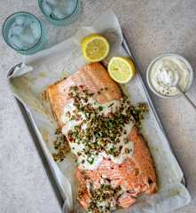 Baked whole-side of salmon with yoghurt dressing