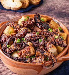 Pulpo y papas en cocción lento