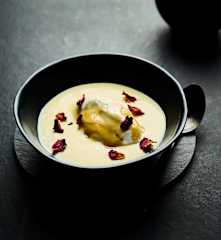 Floating islands on white chocolate custard
