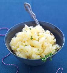 Patate schiacciate all'olio extravergine di oliva