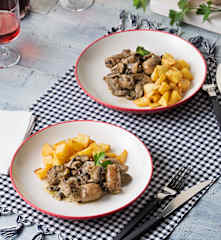 Salteado de butifarra y champiñones