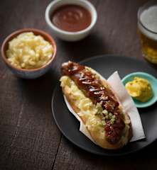 Sausage sizzle with beer braised onions