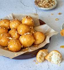 Loukoumades (Greek doughnuts with honey and walnuts)