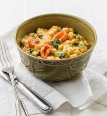 Caril de grão e espinafres