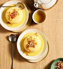 Mini cotton cheesecakes with yuzu curd & black sesame praline